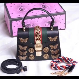 Women's leather handbag bow